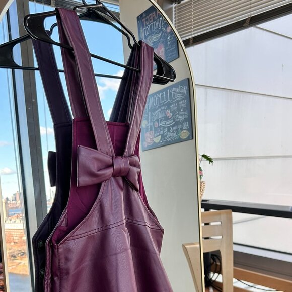 Wine-Purple Faux Leather Pinafore Dress with Side Buttons & Back Bow - Picture 2 of 5